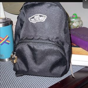 Selling a mini vans backpack in black